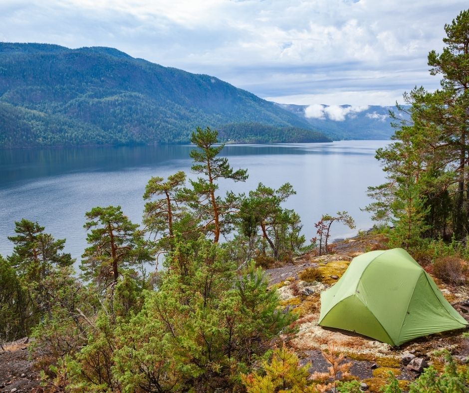 try Wild camping by a lake in Norway