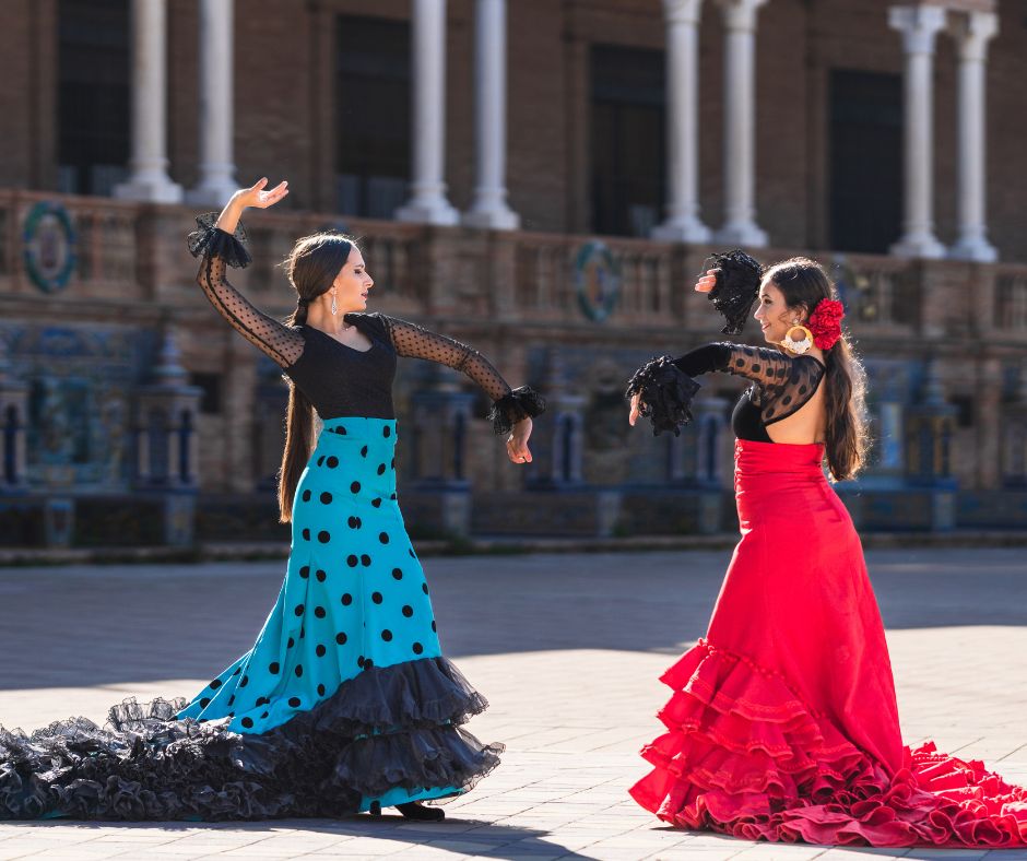  Two Women in Flamenco Colorful Costume Dancing Outdoors